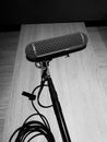 Boom microphones lay down on wood table after using Royalty Free Stock Photo