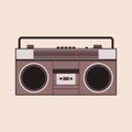 Cassette player on the beige background. Tape recorder.