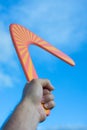 Boomerang in front of a blue sky Royalty Free Stock Photo
