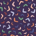 Boomerang seamless pattern on purple background. Abstract shape endless wallpaper