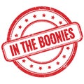 IN THE BOONIES text on red grungy round rubber stamp