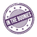 IN THE BOONIES text written on purple indigo grungy round stamp