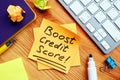 Boost credit score mark on the piece of paper.