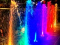 Boosted Color Water Fountain Jets at Night Royalty Free Stock Photo
