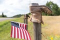 Boot on Fence Post with American Flag Royalty Free Stock Photo