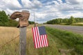 Boot on Fence Post with American Flag Royalty Free Stock Photo