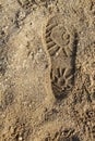 Boot print on the sand Royalty Free Stock Photo