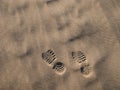 Boot prints in desert sun