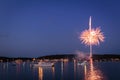 Boats in the harbor during fireworks display, slow shutter, motion blur