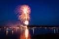 Boats in the harbor during fireworks display, slow shutter, motion blur