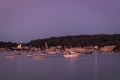 Boats in the harbor at dusk before fireworks display, slow shutter, motion blur