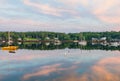 Boothbay Harbor Marina, Maine, at sunrise in summer in soft beautiful light on reflective water