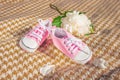 Babys booteeson a beige plaid. Children`s shoes