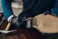 Bootmaker repairing the shoe, footwear repair