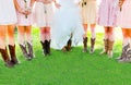Boots and Legs of Girls in Wedding Party Royalty Free Stock Photo