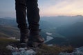 boots of lonely Backpacker on the hill of the mountain Royalty Free Stock Photo