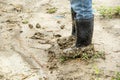 Boots soiled filled with soil densely.