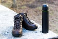 Boots for tourism and thermos. Things tourist and hunter