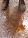 Boots on Wet Rusty Ground