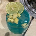 Boozy Blue Hawaii Cocktail with Pineapple and lime.