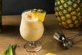 Boozy PIneapple Painkiller Cocktail