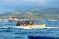 Tourists ride a Banana Boat on Boracay sea Royalty Free Stock Photo