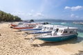 Boracay, Malay, Aklan, Philippines - Small ferry boats beached on the shoreline during low tide