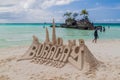 BORACAY, PHILIPPINES - FEBRUARY 3, 2018: Label Boracay made of sand at the White Beach on Boracay island, Philippin Royalty Free Stock Photo