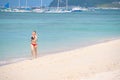 Boracay, Philippines - Jan 23, 2020: Beautiful girl running on the beach in Boracay island. Royalty Free Stock Photo