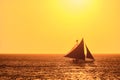 Boracay, Philippines - Jan 23, 2020: Sunset on Boracay island. Sailing and other traditional boats with tourists on the Royalty Free Stock Photo