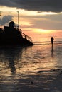 Silhouettes at sunset. Willy rock. White Beach. Boracay island. Western Visayas. Philippines Royalty Free Stock Photo