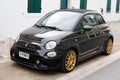 Abarth fiat car 500 golden black race vehicle sport automobile parked in street