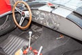Bordeaux , Aquitaine / France - 06 14 2020 : AC Cobra logo sign steering wheels of sports car black interior of vintage old race