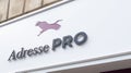 Adresse pro sign and purple logo text of commercial and professional real estate agency