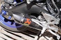 Akrapovic Exhaust Systems brand logo and text sign muffler on custom motorcycle