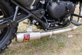 Akrapovic Exhaust Systems brand logo and text sign on royal enfield muffler on custom