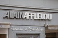 alain afflelou logo brand and text sign wall facade of french store street optic