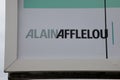 alain afflelou logo text and brand sign front facade store medical optician glasses