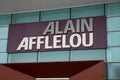 alain afflelou text sign and brand logo facade wall of medic store french Optician