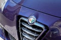 Alfa romeo logo sign front grill on italian automobile car manufacturer