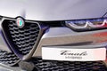 Alfa romeo tonale suv hybrid logo text and brand sign front silver grill italian