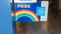 American express logo brand and sign text celebrating pride lgbt rainbow on door