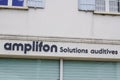 Amplifon sign text and brand logo front of shop medic hearing aid store office
