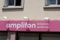 Amplifon text and logo sign shop hearing aid store brand