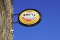 Amstel dutch beer brand sign and logo text on wall facade restaurant bar pub Royalty Free Stock Photo