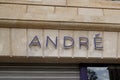 Andre sign brand and text logo shoes store facade apparel and footwear retailer