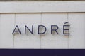 Andre text and logo sign front of shoes store footwear retail