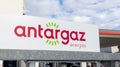 Antargaz logo sign and text brand on steel cage for the presentation and sale of