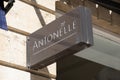 antonelle logo brand and sign text entrance facade wall chain boutique fashion clothes