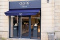 APM Monaco logo brand and text sign on facade boutique fashion jewelry shop fashion